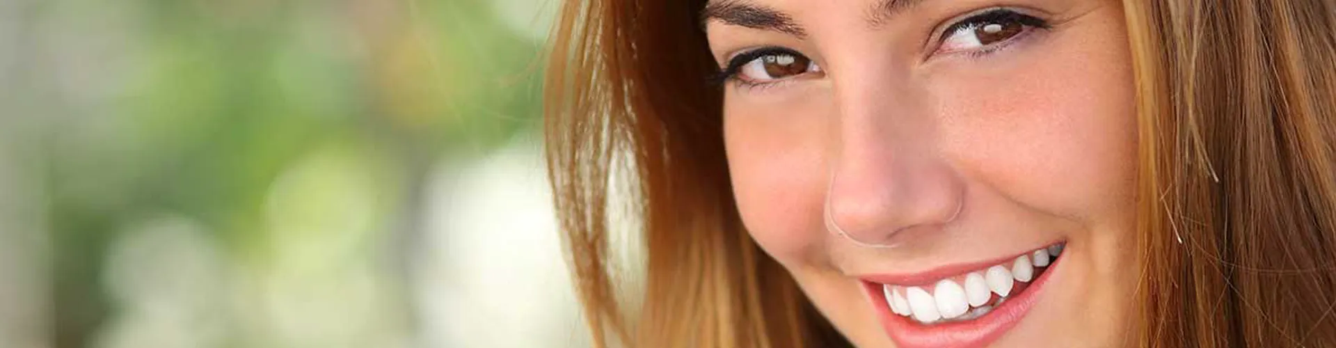 A woman smiling.